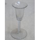 18th / 19th century inverted bell form wine glass, with air twist stem. Approx. 15.5cms hieght.