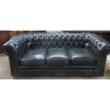 20th century upholstered Chesterfield style button back three seater settee. Approx. 69cm H x