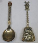 Unhallmarked Dutch silver diorama caddy spoon, plus 925 enamelled silver spoon