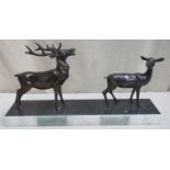 Art Deco style bronze effect figure group, depicting a stag and a fawn, on marble base. Approx. 31cm
