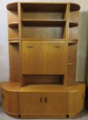 G-Plan, mid 20th century teak wall unit with drop down front, plus pair of corner shelf units to