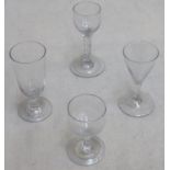 18th/19th facet cut stemmed drinking glass, plus three other various stemmed drinking glasses