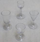 18th/19th facet cut stemmed drinking glass, plus three other various stemmed drinking glasses