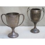 Two hallmarked silver two handled trophies, by walker and hall and Joseph Gloster. Total weight