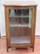 Inlaid mahogany bow fronted single door display cabinet. Approx. 84.5cm H x 54cm W x 14.5cm D