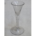 18th / 19th century trumpet form wine glass, with air twist stem. Approx. 17cms hieght.