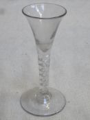 18th / 19th century trumpet form wine glass, with air twist stem. Approx. 17cms hieght.