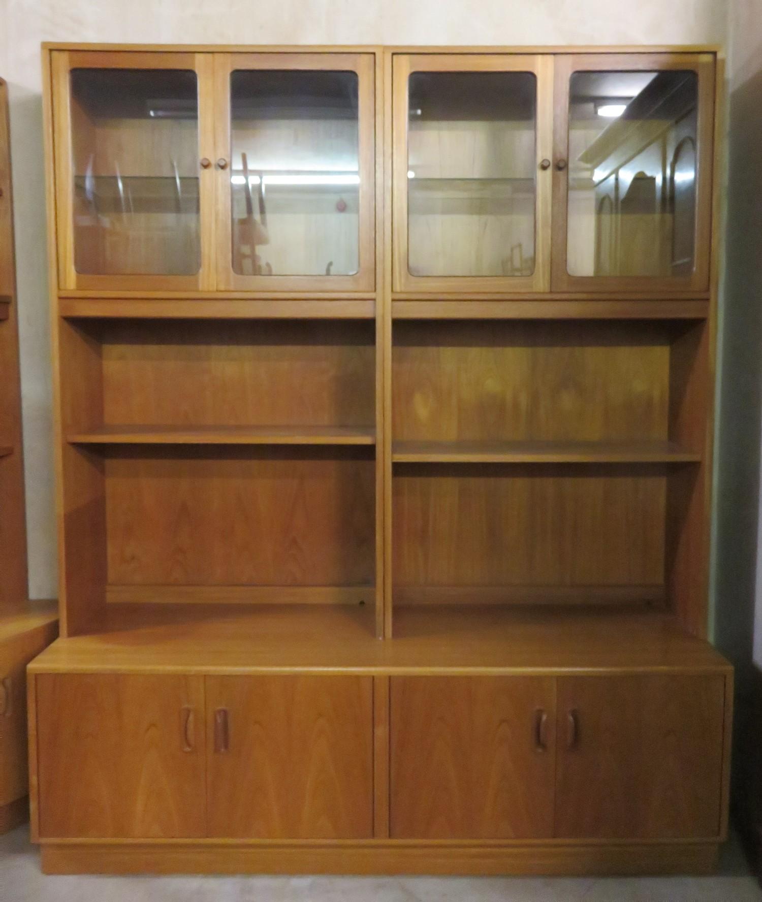 G-Plan, mid 20th century teak four door glazed wall display unit, with cupboard doors and open