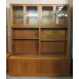 G-Plan, mid 20th century teak four door glazed wall display unit, with cupboard doors and open