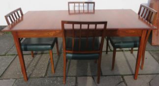 Mid 20th century Rosewood extending dining chairs with one leaf, plus four chairs