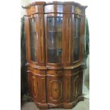 20th century inlaid mahogany Italian style serpentine fronted three door glazed display cabinet.