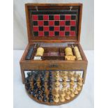 Victorian oak games compendium, possibly by Chad Valley, containing game pieces, Inc. leather