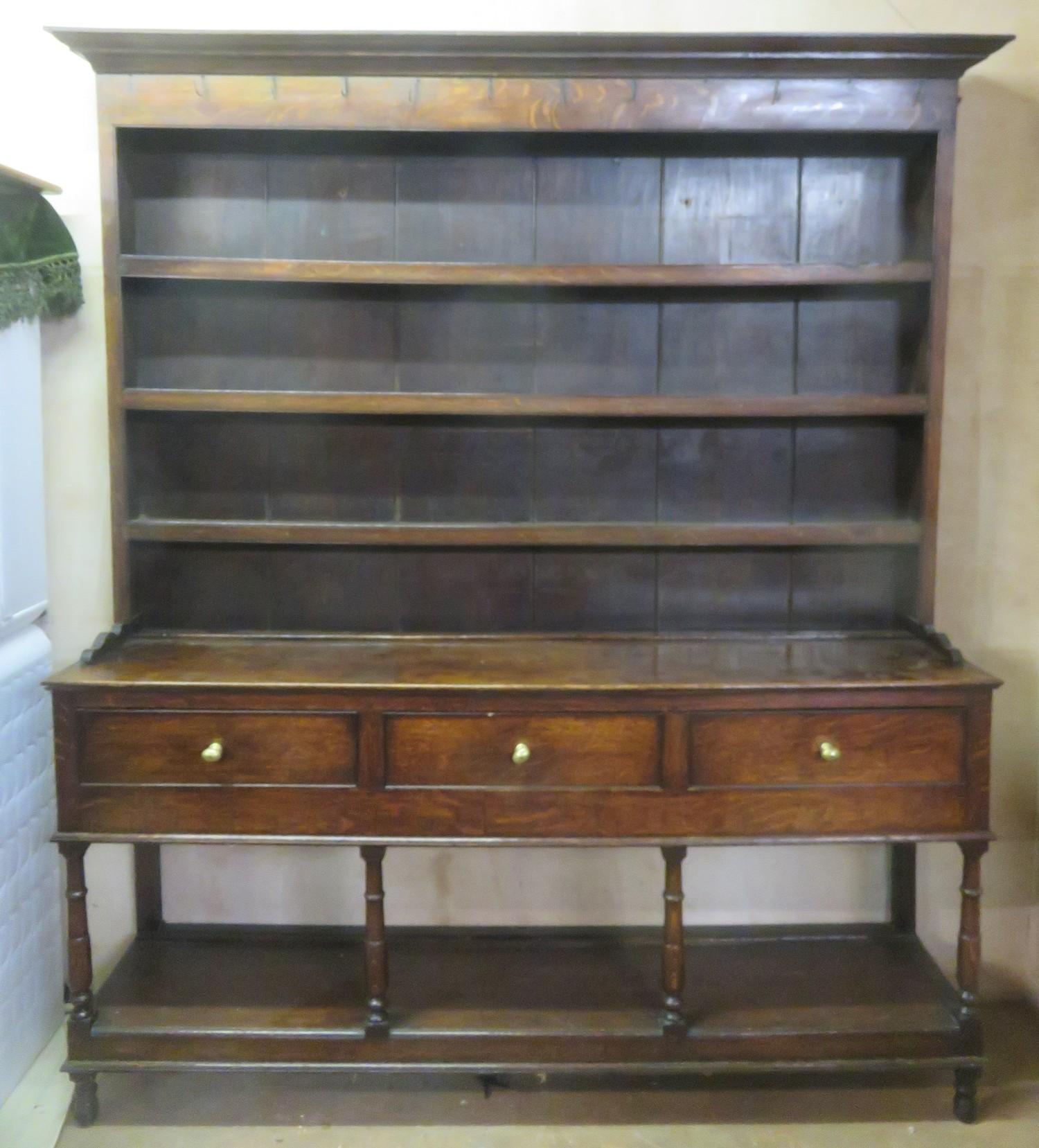 19th oak three drawer welsh style kitchen dresser, with plate rack and pot board. Approx. 222cm H