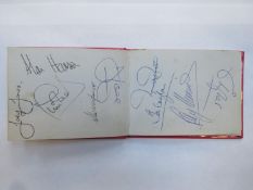 Album containing an assortment of mostly 1970's/1980's Liverpool FC autographs, Inc. Bob Paisley,