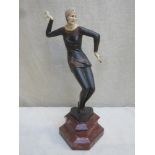 Art Deco style bronze effect and ivorine figure depicting a dancer, mounted on marble base.