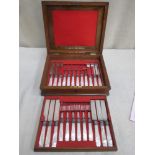 Mid 19th century walnut veneered canteen case of 12 silver plated knives and forks, all with