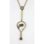 A boxed Edwardian 9ct yellow gold amethyst and seed pearl set necklace, L. 5.5cm.