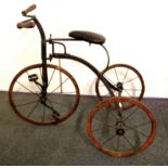 An early child's iron tricycle, H. 63cm.