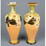 A pair of Royal Doulton stoneware vases, H. 27cm (one with small repair to foot).