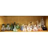 A quantity of vintage perfume bottles and atomisers.