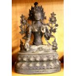 A Tibetan bronze figure of the seated Tara, H. 35cm.