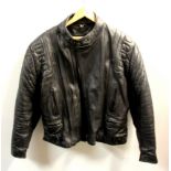 A vintage leather motorcycle jacket, size 46.