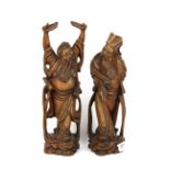 A pair of early 20th Century Chinese carved hardwood figures, H. 37cm.