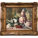 A large gilt framed oil on canvas of a still life signed A Roman, framed size 81.5 x 70cm.