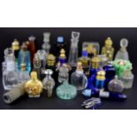 A collection of small vintage perfume bottles.