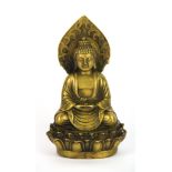 A Tibetan figure of the seated Buddha, H. 14cm.