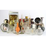 A quantity of miniature perfume bottles.