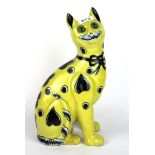 A Galle style porcelain cat figure with glass eyes, H. 34cm.