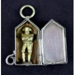 A white metal cased miniature figure of Napoleon, H. 3.5cm.