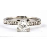 An 18ct white gold solitaire ring set with a 0.93 brilliant cut diamond (colour E-F, clarity SI2)