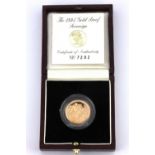 A boxed 1995 gold proof sovereign.