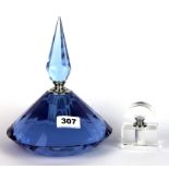 A large purple glass perfume bottle together with a further glass perfume bottle, tallest 24cm.