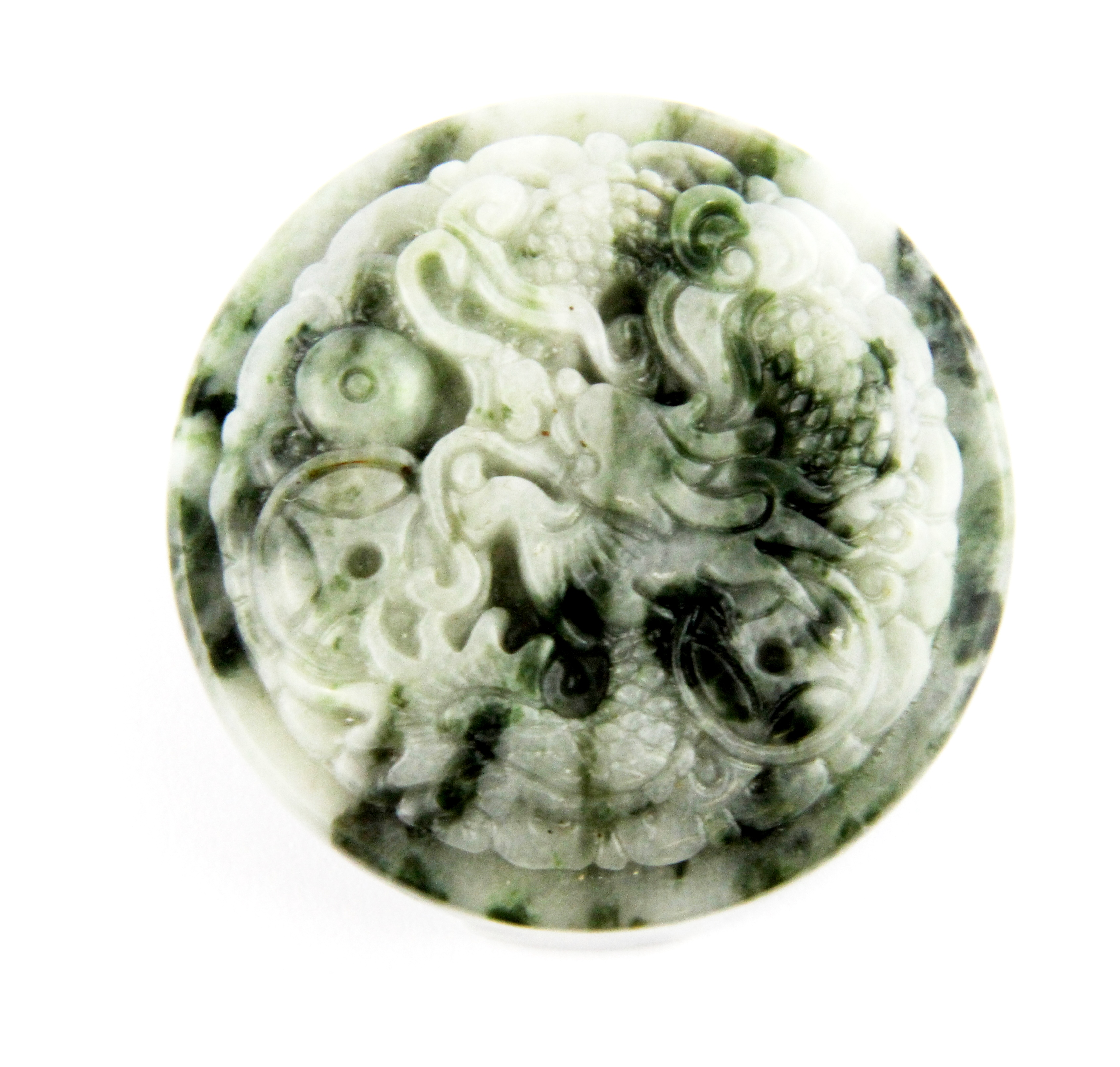 A Chinese carved jade belt buckle, Dia. 5.5cm.