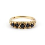 A 9ct yellow gold sapphire set ring, (N).