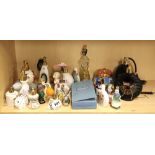 A large quantity of porcelain perfume bottles.