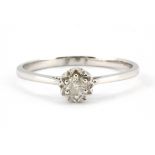 An 18ct diamond set solitaire ring, (N.5).