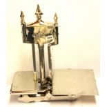 An Art Deco steel BCS shop balance scale, W. 46cm H. 51cm.