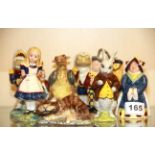 A collection of Beswick 'Alice in Wonderland' series figurines, tallest 12cm.