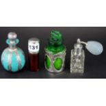 Four hallmarked silver cut and coloured glass perfume and smelling salts bottles.