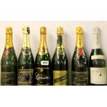 Six bottles of vintage champagne.