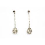 A pair of 900 platinum drop earrings set with a marquise cut diamond surrounded by diamonds, L. 2.