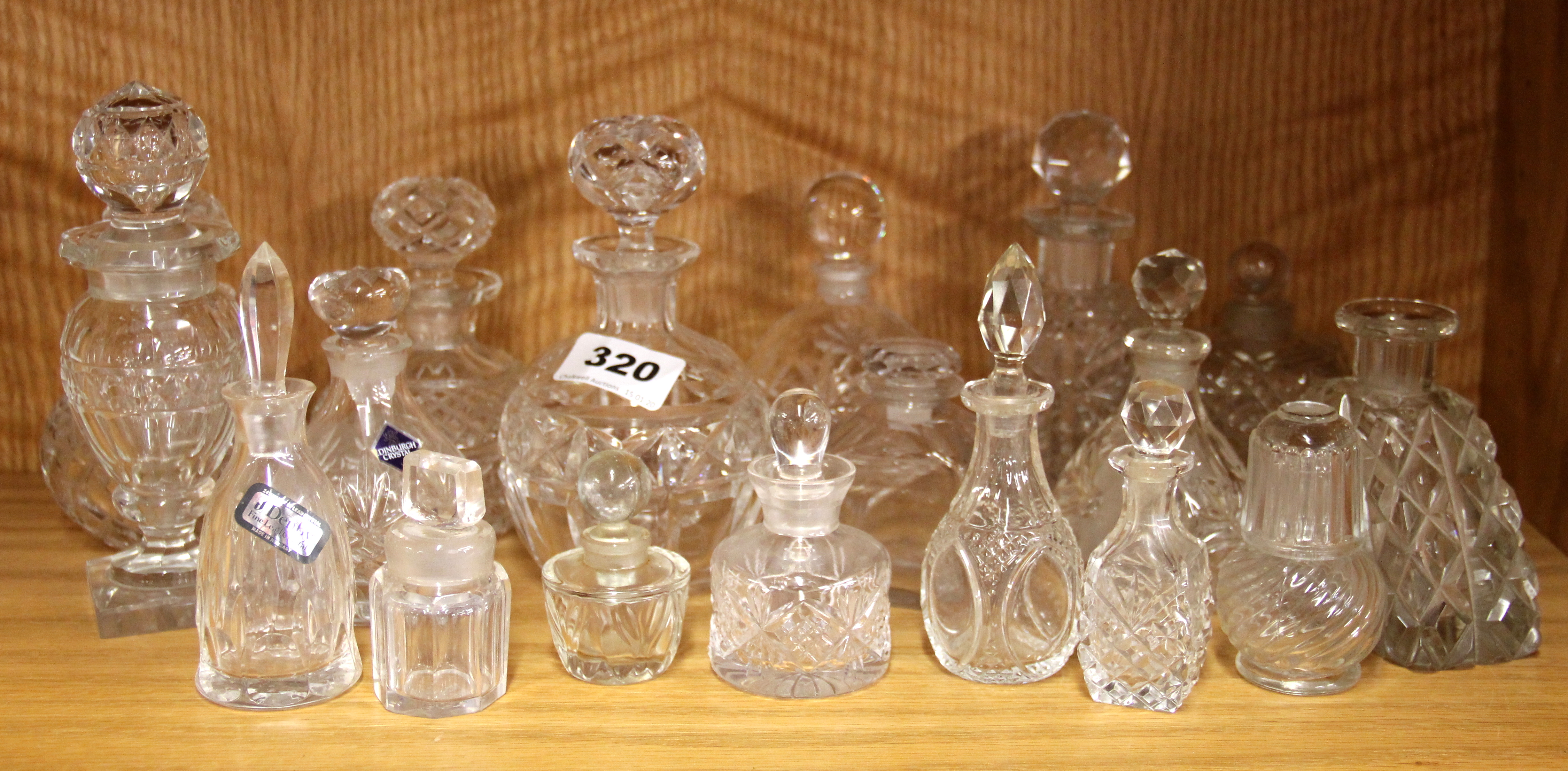 A quantity of glass perfume bottles.