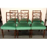 A set of six mahogany Regency style dining chairs.