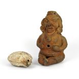 Antiquities Interest. A South American terracotta pottery fertility figure together with a