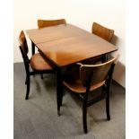 A 1960's extending dining table and four chairs, size 107 x 76cm.