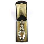 A boxed Victorian white metal and cut glass perfume bottle, H. 12cm.